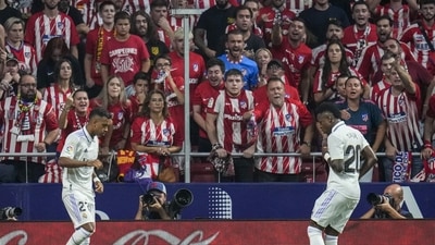 Rodrygo, left, celebrates after scoring with his teammate Real Madrid's Vinicius Junior the opening goal during the Spanish La Liga match between Atletico Madrid and Real Madrid at the Wanda Metropolitano (AP) Rodrygo, left, celebrates after scoring with his teammate Real Madrid's Vinicius Junior the opening goal during the Spanish La Liga match between Atletico Madrid and Real Madrid at the Wanda Metropolitano (AP)