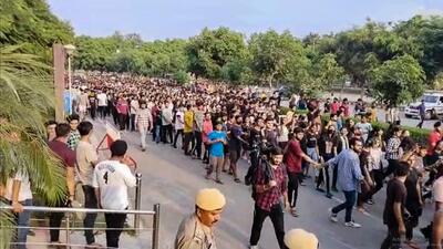 Students stage a protest over “objectionable videos”. (PTI) Students stage a protest over “objectionable videos”. (PTI)