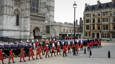 Queen Elizabeth II’s coffin was carried on a gun carriage to Westminster Abbey, followed by King Charles III and other members of the royal family. (AP)
