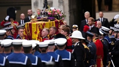Queen Elizabeth II’s coffin carried on a gun carriage to Westminster Abbey (AP)