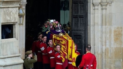 Queen Elizabeth's coffin began a procession from London to Windsor Castle, where the queen will be laid to rest (AP)