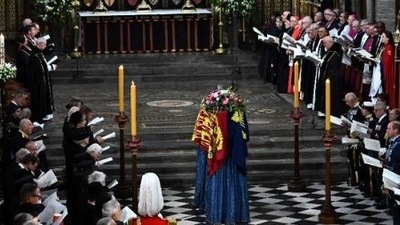 The funeral of Britain's longest-serving monarch ended with "God Save the King", the reworded national anthem after her son Charles's accession. (AFP)