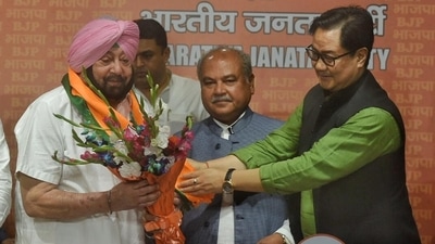 Former Punjab CM Capt Amarinder Singh joins BJP in the presence of Union Ministers Narendra Singh Tomar, Kiren Rijiju, BJP leader Sunil Jakhar and BJP Punjab chief Ashwani Sharma. (Raj k Raj/ HT Photo) Former Punjab CM Capt Amarinder Singh joins BJP in the presence of Union Ministers Narendra Singh Tomar, Kiren Rijiju, BJP leader Sunil Jakhar and BJP Punjab chief Ashwani Sharma. (Raj k Raj/ HT Photo)