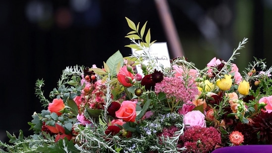 Queen Elizabeth II's Funeral: A card atop the Queen's coffin during her funeral.(AP)