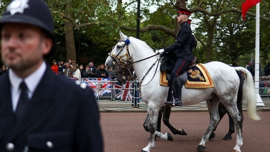 Queen Elizabeth II's Funeral: Guards ride horses on the day of the state funeral and burial of Britain's Queen Elizabeth, in London, Britain.(Reuters)