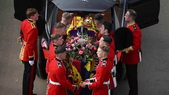 Queen Elizabeth II Funeral: Pallbearers transfer the coffin of Queen Elizabeth II into the State Hearse at Wellington Arch in London.(AP)