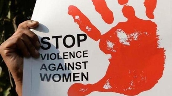 A person holding a banner to oppose acts of rape and violence against women.&nbsp;(AFP/Representative image)