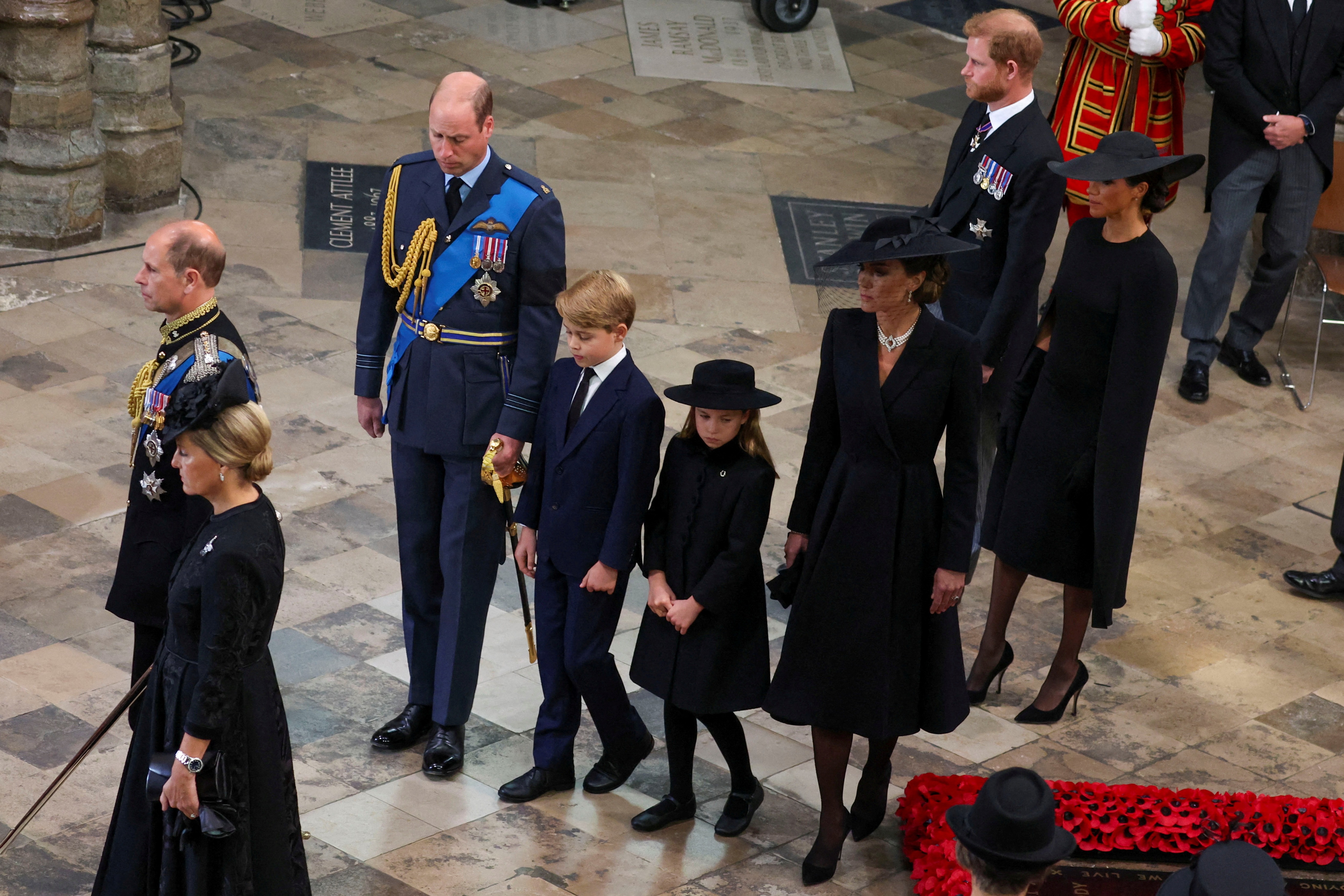 Queen Elizabeth II's Funeral: Britain's William, Prince of Wales, Catherine, Princess of Wales, Prince Harry, Duke of Sussex, Meghan, Duchess of Sussex, Prince George and Princess Charlotte attend the state funeral. (Reuters)