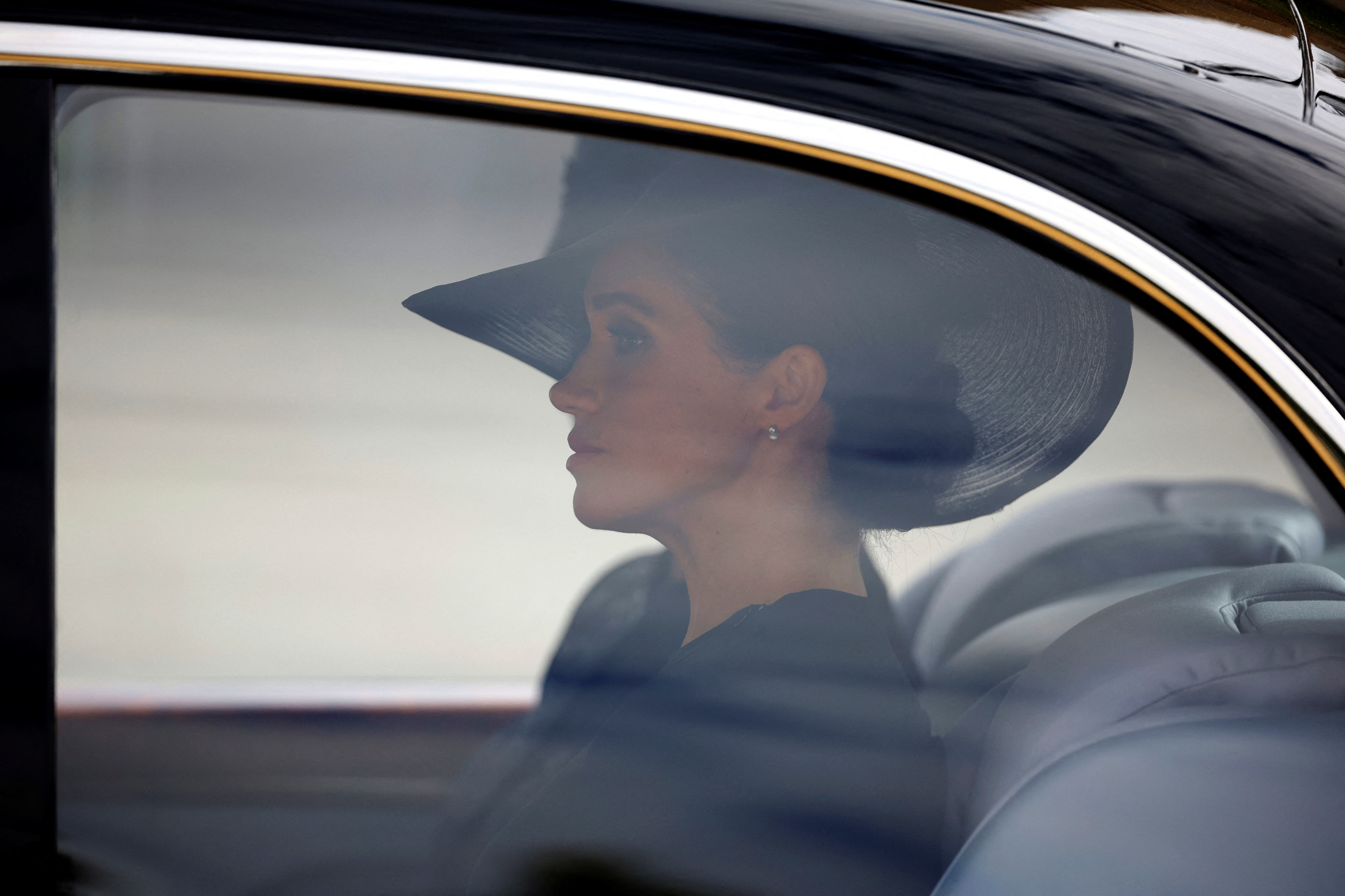 Queen Elizabeth II's Funeral: Britain's Meghan, Duchess of Sussex, sits in a car on the day of the state funeral. (Reuters)