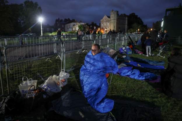 Some people camped outside the castle - where the Queen's coffin lies (Reuters)