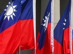 China- Taiwan Crisis: Taiwan flags flutter during a ceremony in Taipei, Taiwan.