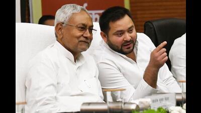 Bihar chief minister Nitish Kumar along with deputy chief minister Tejashwi Prasad Yadav during an event in Patna on Tuesday. (Santosh Kumar/HT Photo) Bihar chief minister Nitish Kumar along with deputy chief minister Tejashwi Prasad Yadav during an event in Patna on Tuesday. (Santosh Kumar/HT Photo)