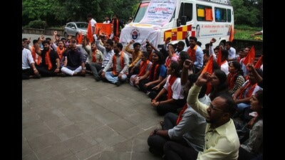 Ambulance protest by ABVP volunteers at SPPU on Tuesday. (Ravindra Joshi/HT PHOTO)