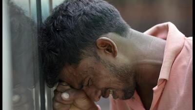 Noida, India- September 20, 2022: Brother of Pushpendra, a victim of the wall collapse incident breaks down outside the mortuary at sector 30, in Noida, India, on Tuesday, September 20, 2022. (Photo by Sunil Ghosh / Hindustan Times) (Hindustan Times) Noida, India- September 20, 2022: Brother of Pushpendra, a victim of the wall collapse incident breaks down outside the mortuary at sector 30, in Noida, India, on Tuesday, September 20, 2022. (Photo by Sunil Ghosh / Hindustan Times) (Hindustan Times)