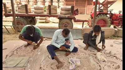 Workers prepare stones for the construction of Ram temple, at a workshop in Ayodhya. (PTI File Photo) Workers prepare stones for the construction of Ram temple, at a workshop in Ayodhya. (PTI File Photo)