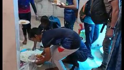 Food that was allegedly stored in a toilet being served to kabaddi players at a state-level tournament in Saharanpur. (PTI Photo) Food that was allegedly stored in a toilet being served to kabaddi players at a state-level tournament in Saharanpur. (PTI Photo)