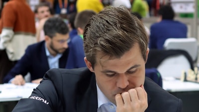 Norwegian Chess Grandmaster Magnus Carlsen makes a move during a match of 10th round at the 44th FIDE Chess Olympiad (ANI)