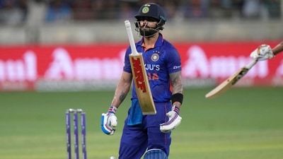 India's Virat Kohli reacts as he walks off the field after losing his wicket (AP) India's Virat Kohli reacts as he walks off the field after losing his wicket (AP)