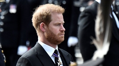 Queen Elizabeth II's Funeral: Britain's Prince Harry follows the coffin of Queen Elizabeth II in London. (Reuters)