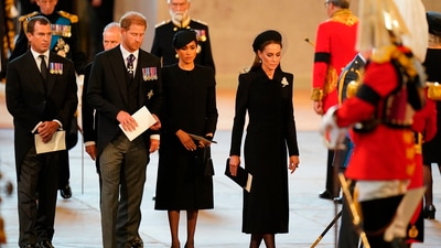 Queen Elizabeth II's Funeral: Prince Harry, Meghan, the Duchess of Sussex, Kate, Princess of Wales follow the bearer party carrying the coffin of Queen Elizabeth II. (AP) Queen Elizabeth II's Funeral: Prince Harry, Meghan, the Duchess of Sussex, Kate, Princess of Wales follow the bearer party carrying the coffin of Queen Elizabeth II. (AP)