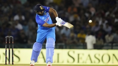 India's captain Rohit Sharma hits a six during the first T20I match between India and Australia (AP) India's captain Rohit Sharma hits a six during the first T20I match between India and Australia (AP)