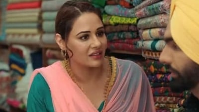 Mandy Takhar with Ammy Vrik in a still from Sunil Puri -directorial Chhalle Mundiyan. Mandy Takhar with Ammy Vrik in a still from Sunil Puri -directorial Chhalle Mundiyan. 
