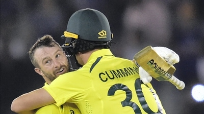 Mathew Wade (L) and Pat Cummins celebrate Australia's victory in the first T20 against India (PTI)
