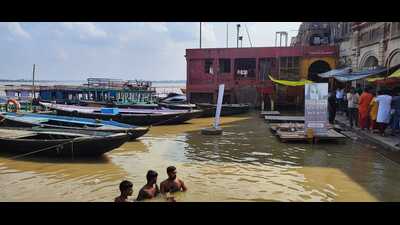 Rising water level in the Ganga at one of the ghats in Varanasi. (HT Photo)