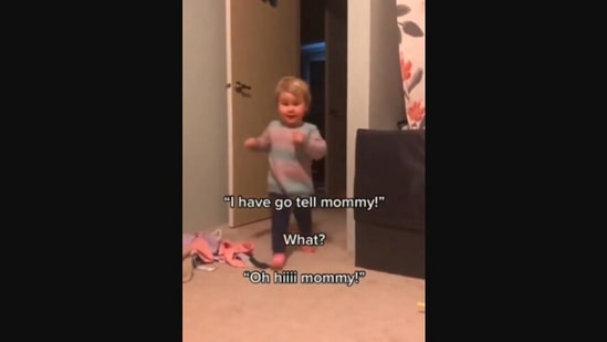The image, taken from the Instagram video, shows the kid running to her mom to share about the vegetable she is scared of.(Instagram/@ramzi.jbalia)
