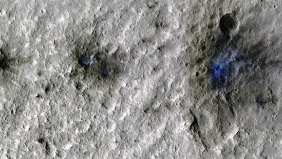 Craters formed by a September 5, 2021, meteoroid impact on Mars, the first to be detected by NASA?s InSight, are seen in an image taken by NASA?s Mars Reconnaissance Orbiter. NASA/JPL-Caltech/University of Arizona/Handout via REUTERS. THIS IMAGE HAS BEEN SUPPLIED BY A THIRD PARTY.(via REUTERS)