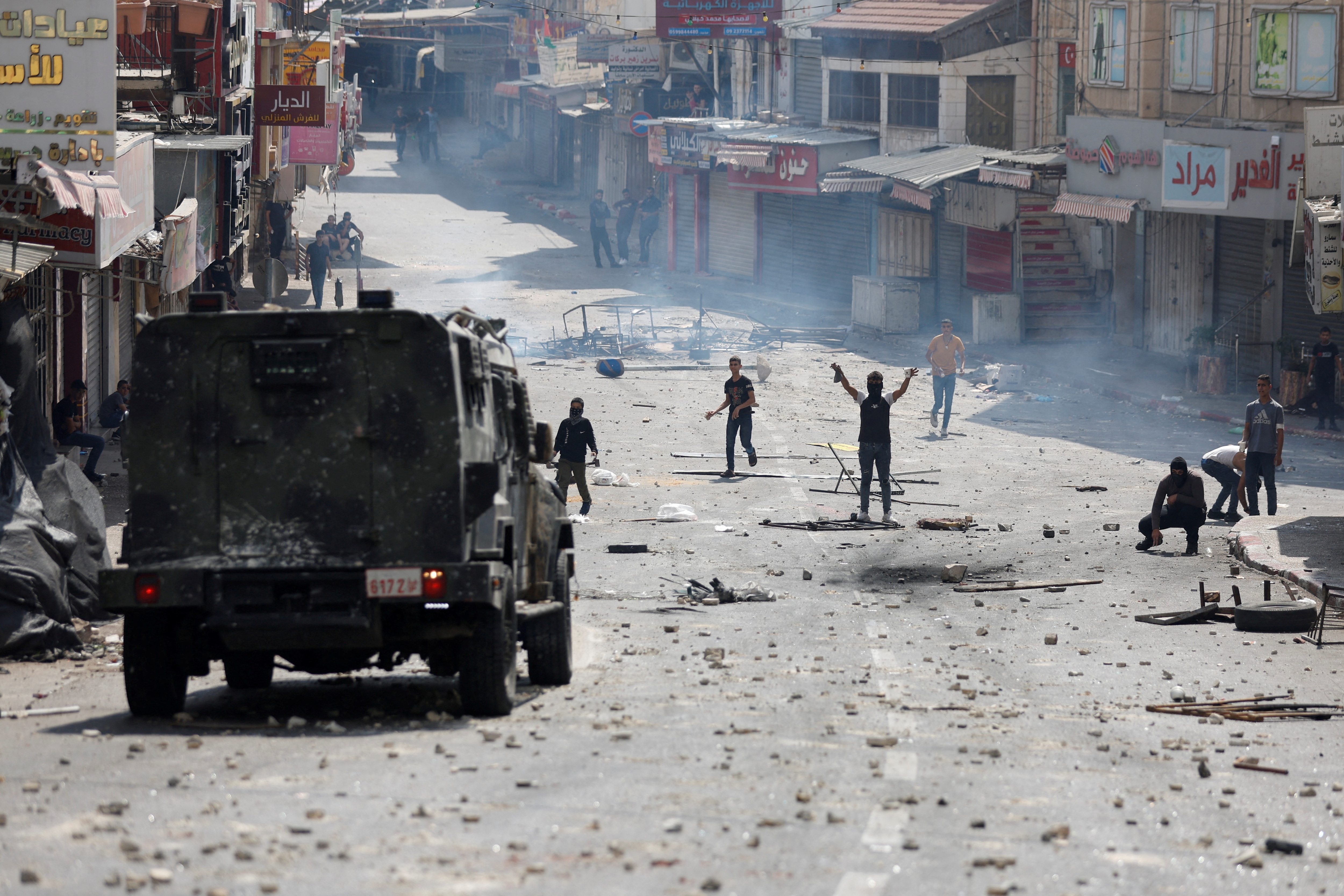 Palestinian demonstrators protesting the arrest of two Palestinian militants clash with Palestinian security forces, in Nablus in the Israeli-occupied West Bank on Tuesday.&nbsp; (Reuters)