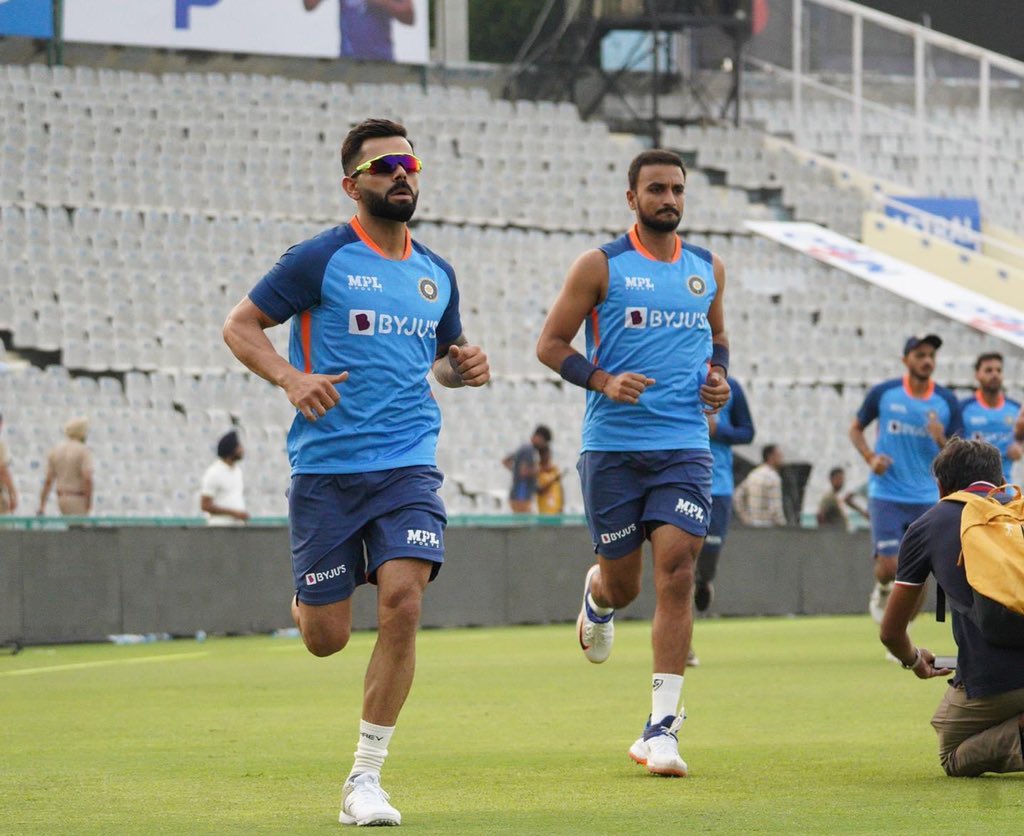 Virat Kohli with Harshal Patel Virat Kohli with Harshal Patel