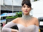 Nora Fatehi's as she arrives for Jhalak Dikhhla Jaa 10. Nora Fatehi's as she arrives for Jhalak Dikhhla Jaa 10.