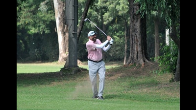 A club member in action during the Chandigarh Golf League at Chandigarh Golf Club on Wednesday. (Ravi Kumar/HT)