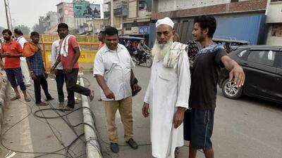 Locals gather at the site where a speeding truck mowed down people sleeping on the road divider, in Seemapuri, New Delhi on Wednesday. (Sanjeev Verma/HT Photo) Locals gather at the site where a speeding truck mowed down people sleeping on the road divider, in Seemapuri, New Delhi on Wednesday. (Sanjeev Verma/HT Photo)