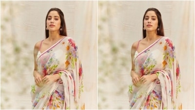 Janhvi teamed her saree with a slip blouse featuring same design. The blouse came with a plunging neckline and pink slip shoulders. (Instagram/@janhvikapoor)