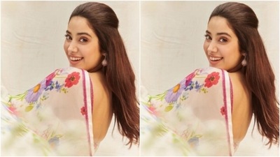 Janhvi minimally accessorised her look for the day in earrings with dangling pearls as she posed for the pictures. (Instagram/@janhvikapoor)
