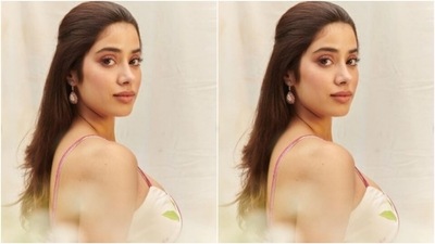 Janhvi wore a part of her tresses into a loose ponytail and locked it with a clip, and let the other half of the tresses open in straight locks. (Instagram/@janhvikapoor)