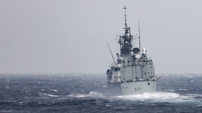 China-Taiwan Conflict: US Navy, The Royal Canadian Navy Halifax-class frigate HMCS Vancouver (FFH 331) transits the Taiwan Strait. (AP) China-Taiwan Conflict: US Navy, The Royal Canadian Navy Halifax-class frigate HMCS Vancouver (FFH 331) transits the Taiwan Strait. (AP)