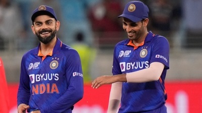 India's Virat Kohli, left, and Bhuvneshwar Kumar leave the field after their win in the T20 cricket match (AP) India's Virat Kohli, left, and Bhuvneshwar Kumar leave the field after their win in the T20 cricket match (AP)