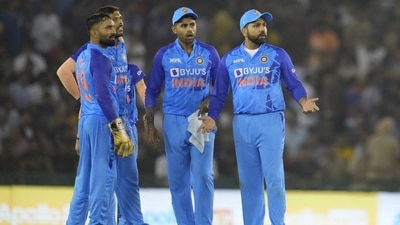 India's captain Rohit Sharma gestures as he stands with teammates before asking for a review (AP) India's captain Rohit Sharma gestures as he stands with teammates before asking for a review (AP)