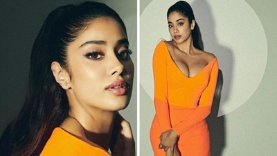 Janhvi Kapoor in orange bodycon dress from her indoor photoshoot.&nbsp;