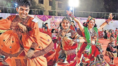 Dandiya enthusiast play garba during Navratri in Panvel. Each year the ground has 18,000 to 20,000 footfall every day. (Hindustan Times) Dandiya enthusiast play garba during Navratri in Panvel. Each year the ground has 18,000 to 20,000 footfall every day. (Hindustan Times)
