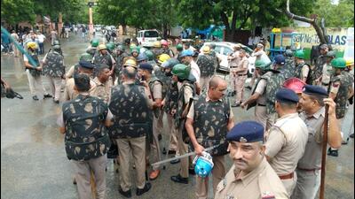 Police personnel at the clash site in Hisar on Wednesday. (HT Photo)