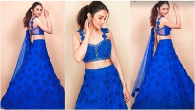 Blue is the colour of Day 3 and Rakul Preet's gorgeous blue lehenga set is perfect for the day. The heavy broderie blouse with heavy singlet ruffled sleeves looks sexy yet classy. If you love dresses with heavy work, this can be a good choice. (Instagram/@sonaakshiraaj) Blue is the colour of Day 3 and Rakul Preet's gorgeous blue lehenga set is perfect for the day. The heavy broderie blouse with heavy singlet ruffled sleeves looks sexy yet classy. If you love dresses with heavy work, this can be a good choice. (Instagram/@sonaakshiraaj)