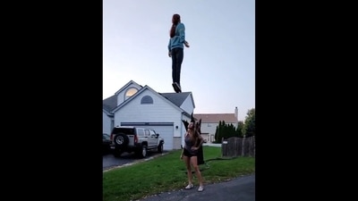 The image, taken from the video, shows Max's effigy levitating with her hands out at her side while another woman looks at it. (Twitter/@ghouligans) The image, taken from the video, shows Max's effigy levitating with her hands out at her side while another woman looks at it. (Twitter/@ghouligans)