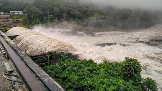 Water flows through the gates of the Peringalkuthu dam after a sluice was opened following heavy rain in Thrissur.(PTI / File/ Representational Image)