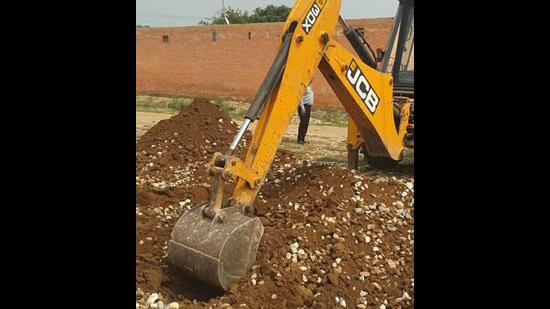 Demolition drive against illegal colonies by GLADA underway in Ludhiana. (HT PHOTO)