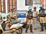 Police personnel during a raid of National Investigation Agency (NIA) at the residence of a functionary of Popular Front of India (PFI), in Madurai.(PTI)