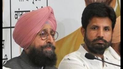 Congress Legislature Party (CLP) leader Partap Singh Bajwa and Punjab Congress president Amarinder Singh Raja Warring.